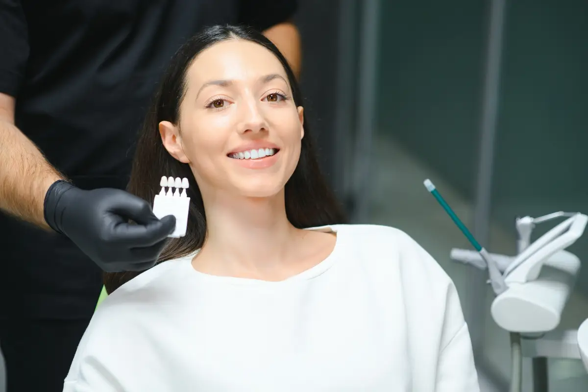 Patient smiling after cosmetic dental treatment